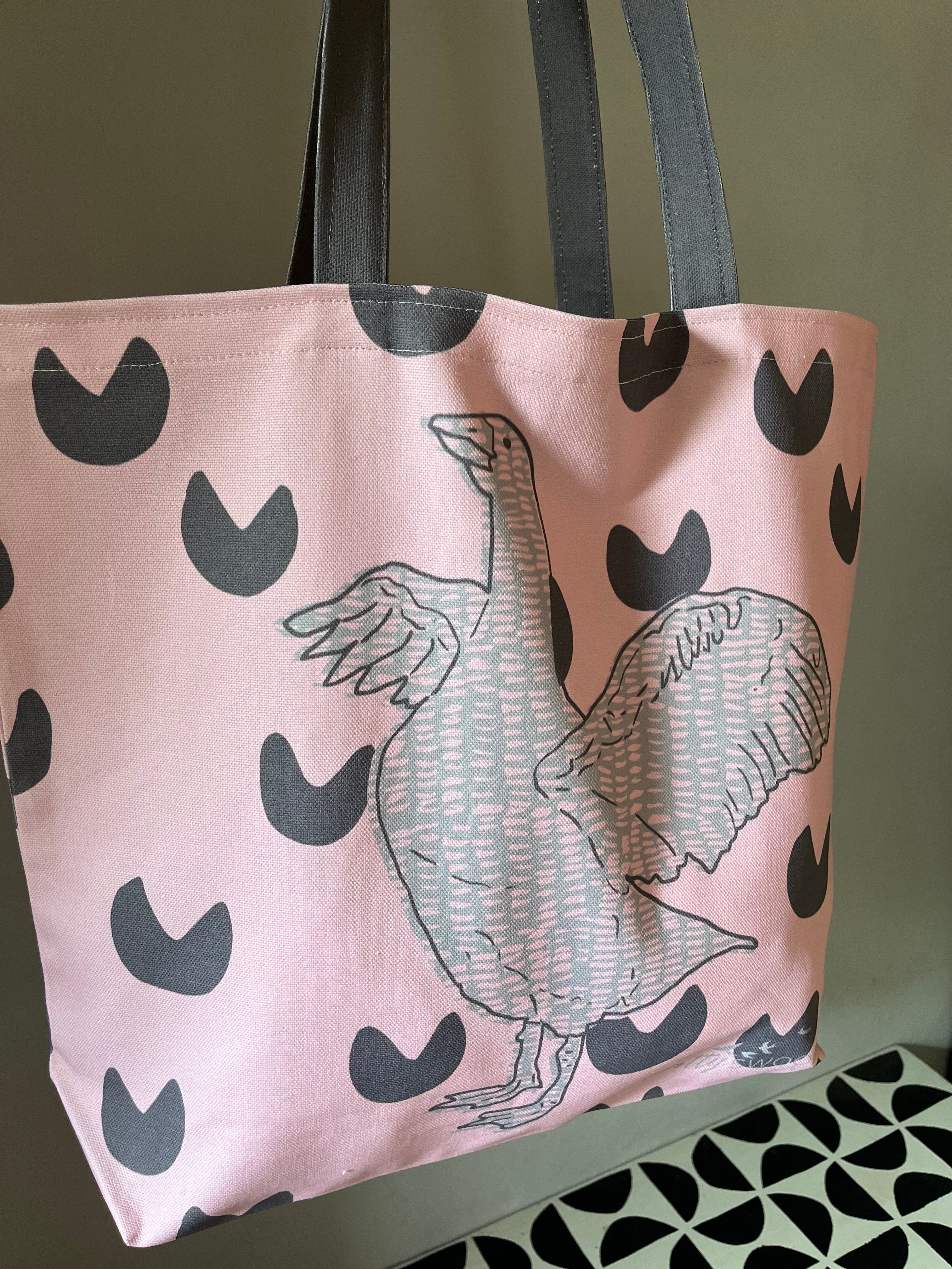 Pink tote bag with goose design